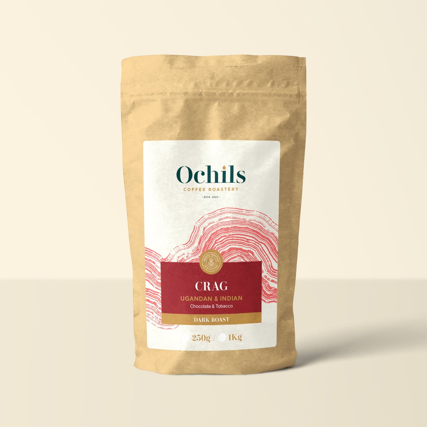 Ochils Coffee bag with red label detail on a beige background